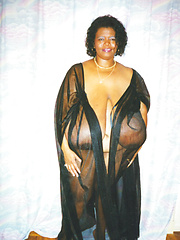 Black mamma shows her really monster tits